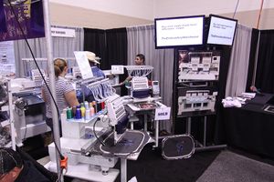 TheEmbroideryWarehouse showing the Butterfly Embroidery Machine at the ISS Show in Fort Worth, Texas 2013